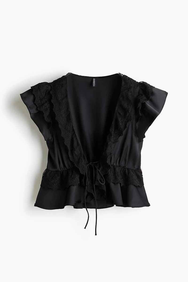 Blouse volantée en satin