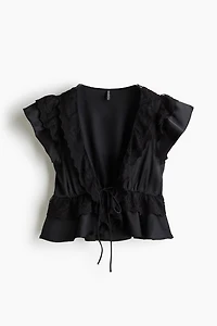 Blouse volantée en satin