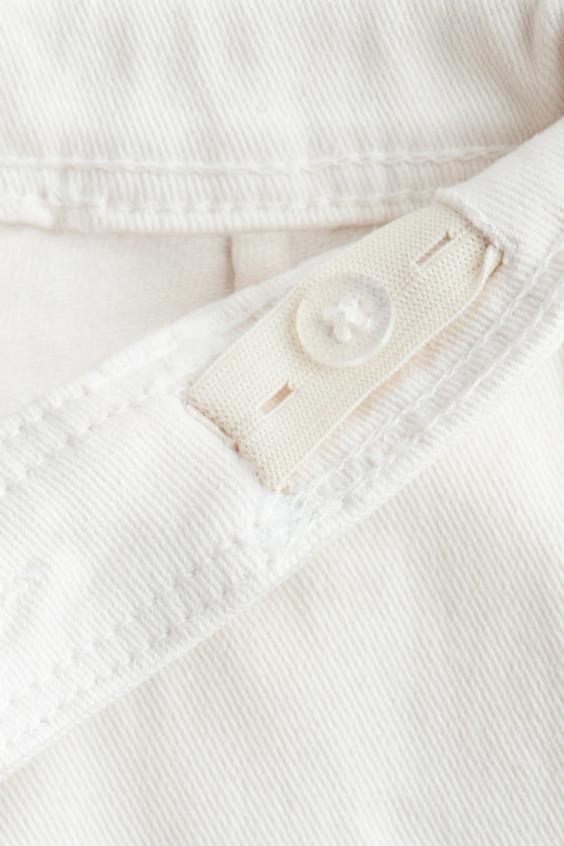 Pantalon évasé avec perles de fantaisie