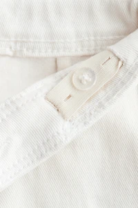 Pantalon évasé avec perles de fantaisie