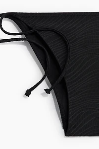 Bas de bikini tanga à nouer