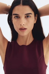 Interlock Sleeveless Peplum Top