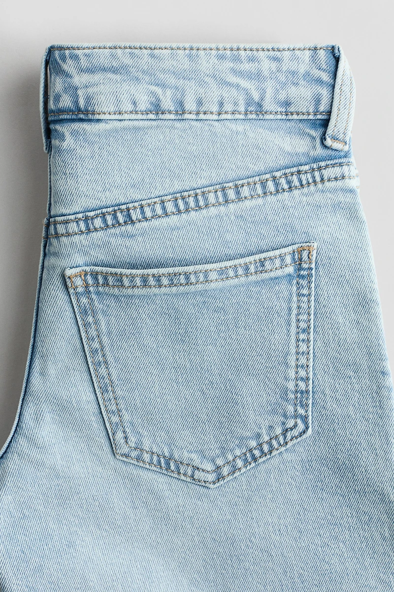 Short taille basse en denim aux jambes larges