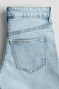 Short taille basse en denim aux jambes larges