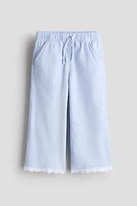 Pantalon en crépon de coton avec dentelle