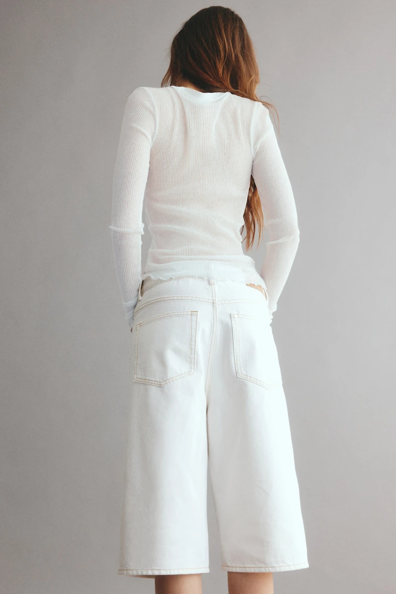 Short en denim haut du genou