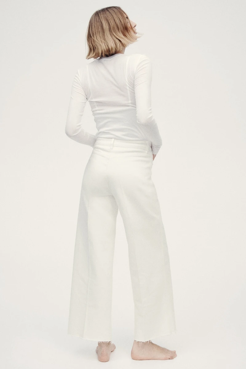 Jean large à la cheville taille haute