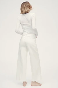 Jean large à la cheville taille haute