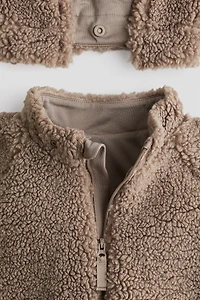 Veste à capuchon en tissu peluche