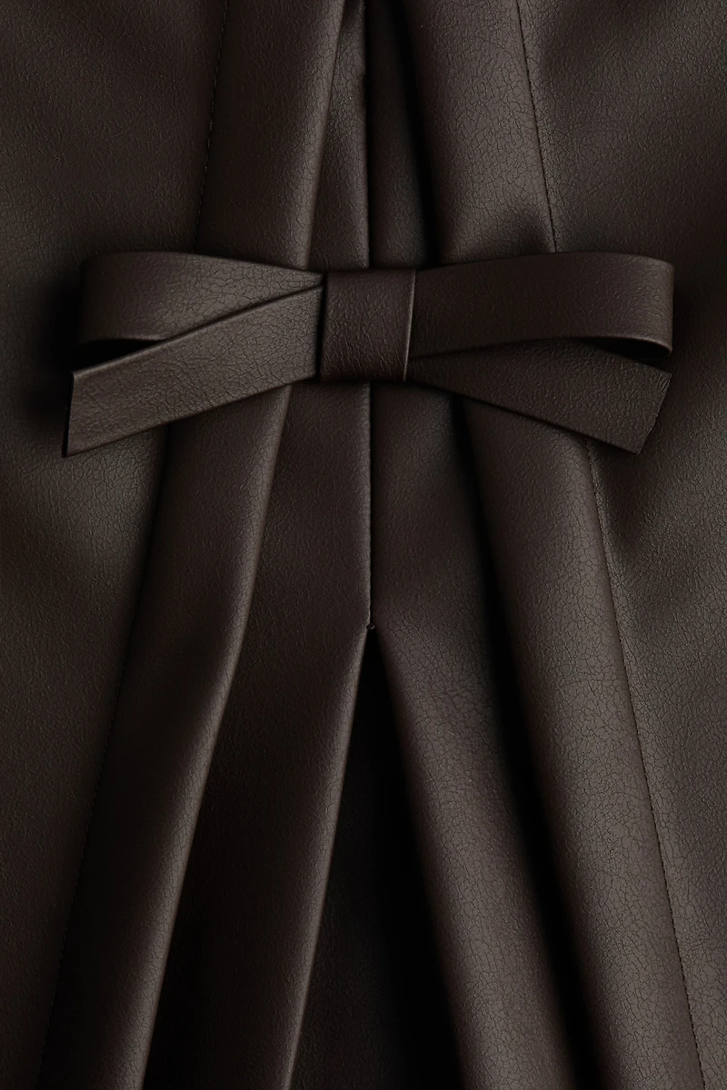 Jupe avec boucle devant