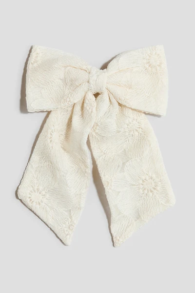 Barrette à nœud brodé