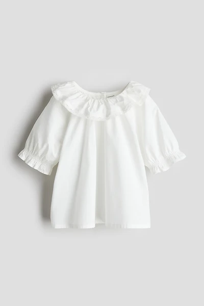 Blouse en coton avec col à volant