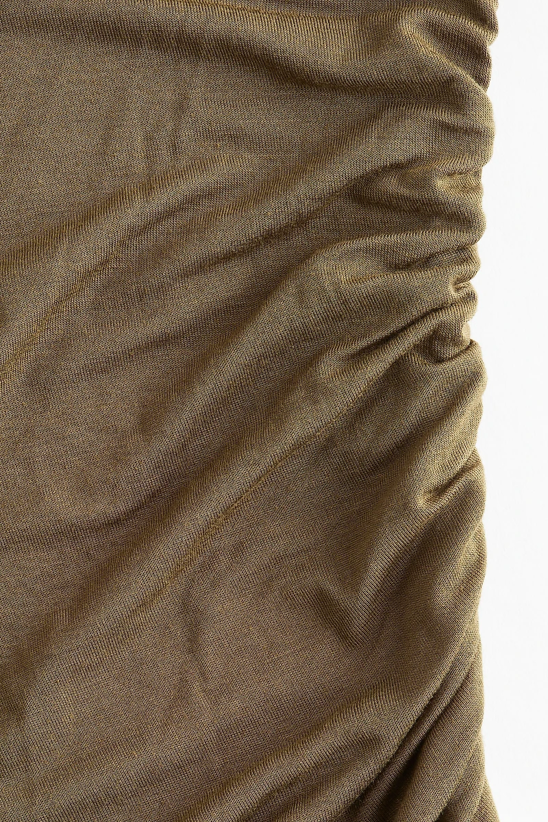 Haut asymétrique à effet drapé