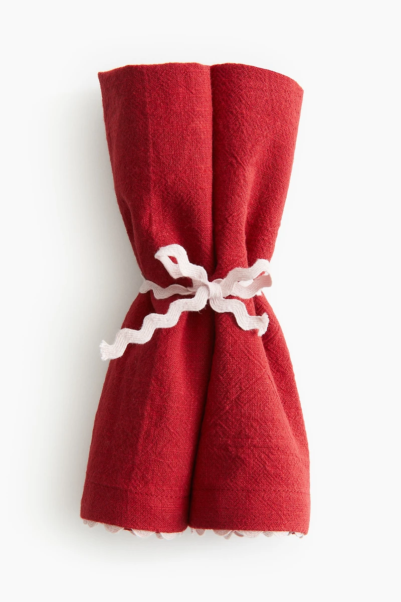 Lot de 2 serviettes table à bords festonnés