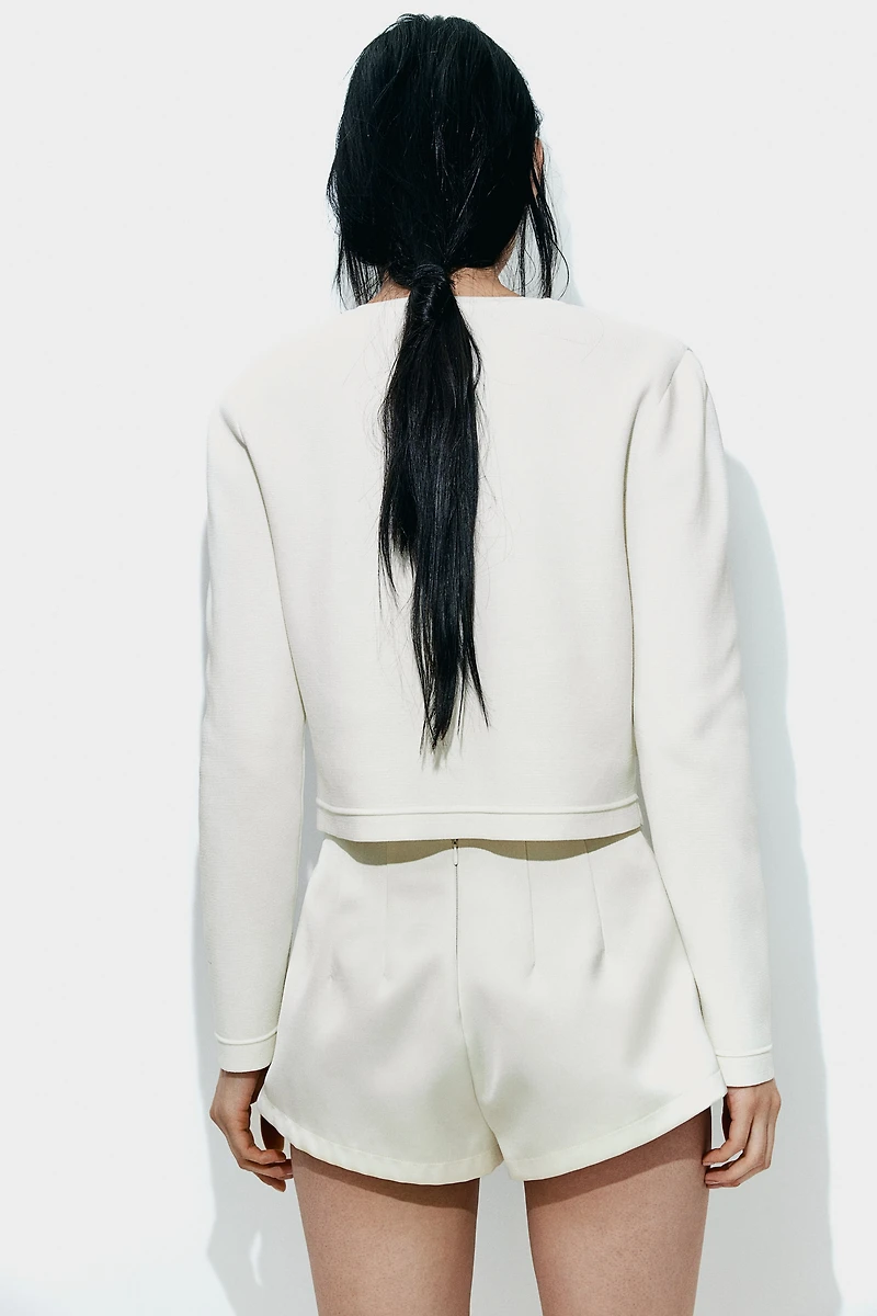 Gilet avec perles de fantaisie