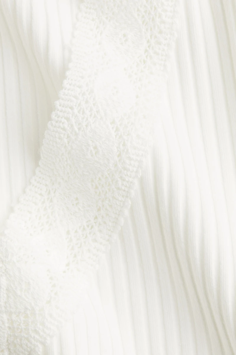 Blouse avec pans à nouer devant