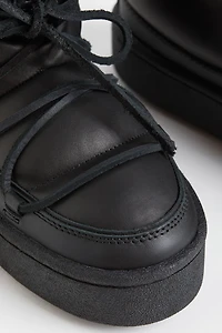 Bottines matelassées à lacets