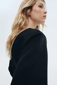 Haut en scuba avec dos décolleté