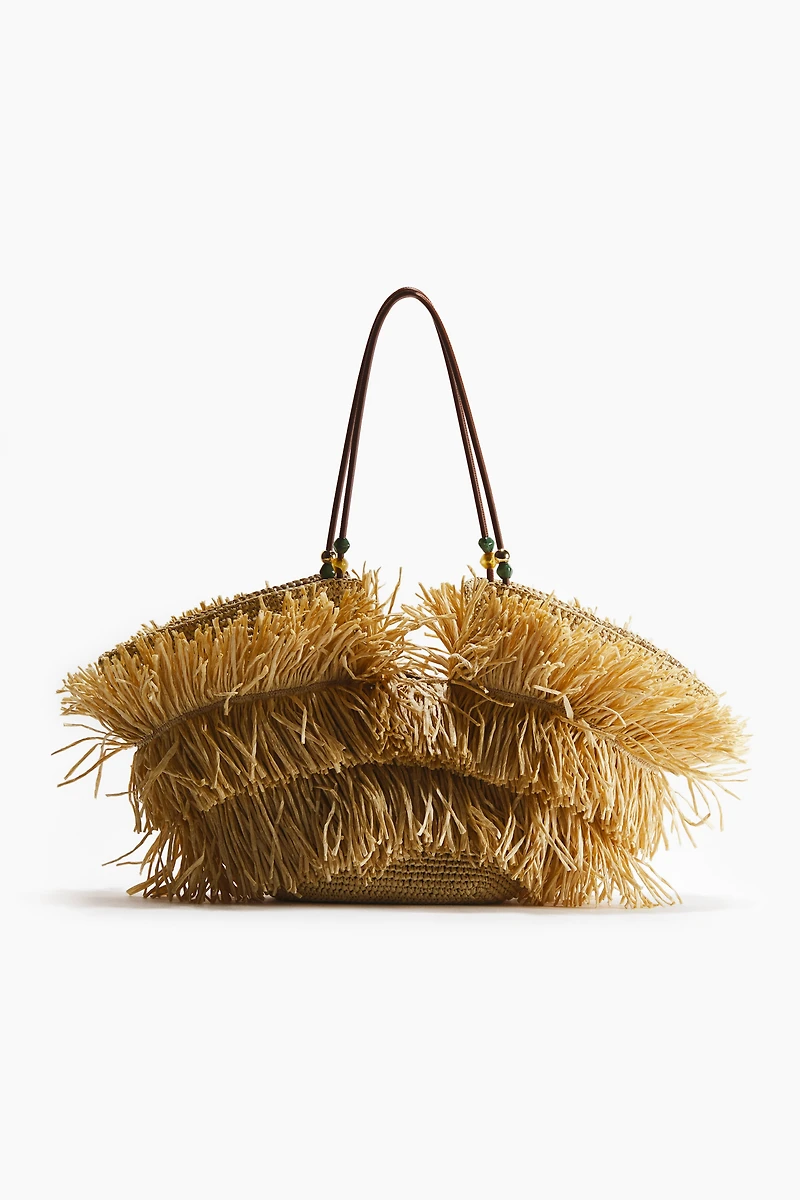 Sac de magasinage frangé en paille