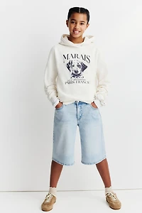 Short taille basse en denim aux jambes larges