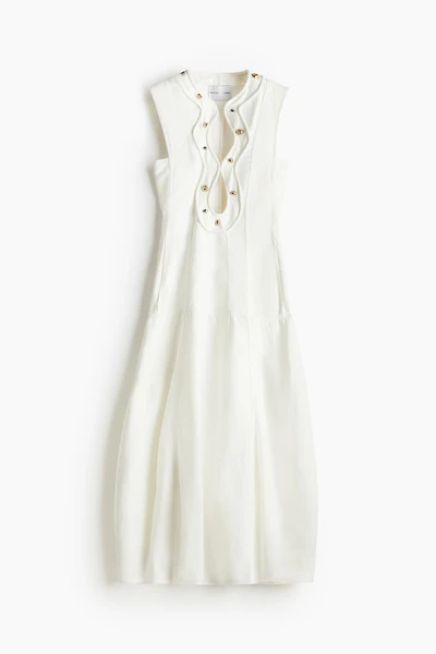 Robe trapèze cloutée