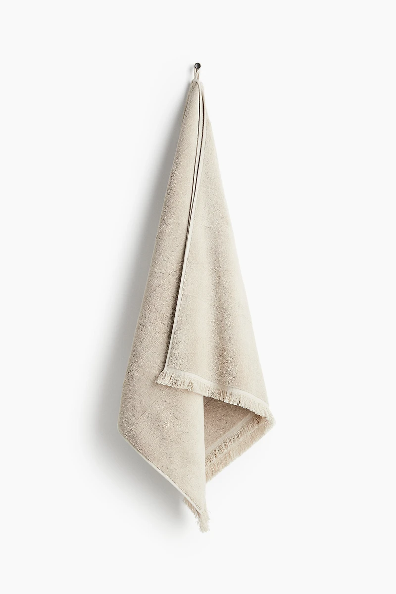 Serviette de bain en coton éponge