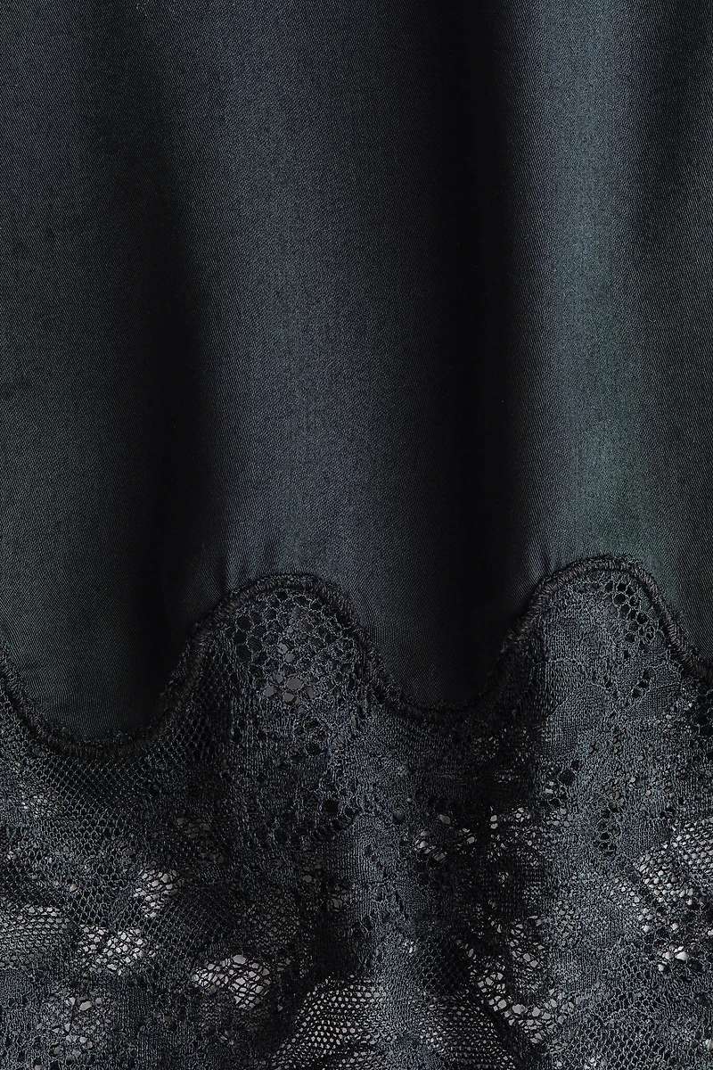 Pantalon de pyjama en satin avec dentelle