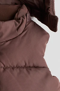 Veste matelassée sans manches avec capuchon