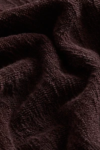 Serviette à franges en coton