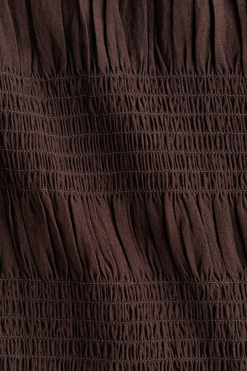 Robe avec nid d'abeille