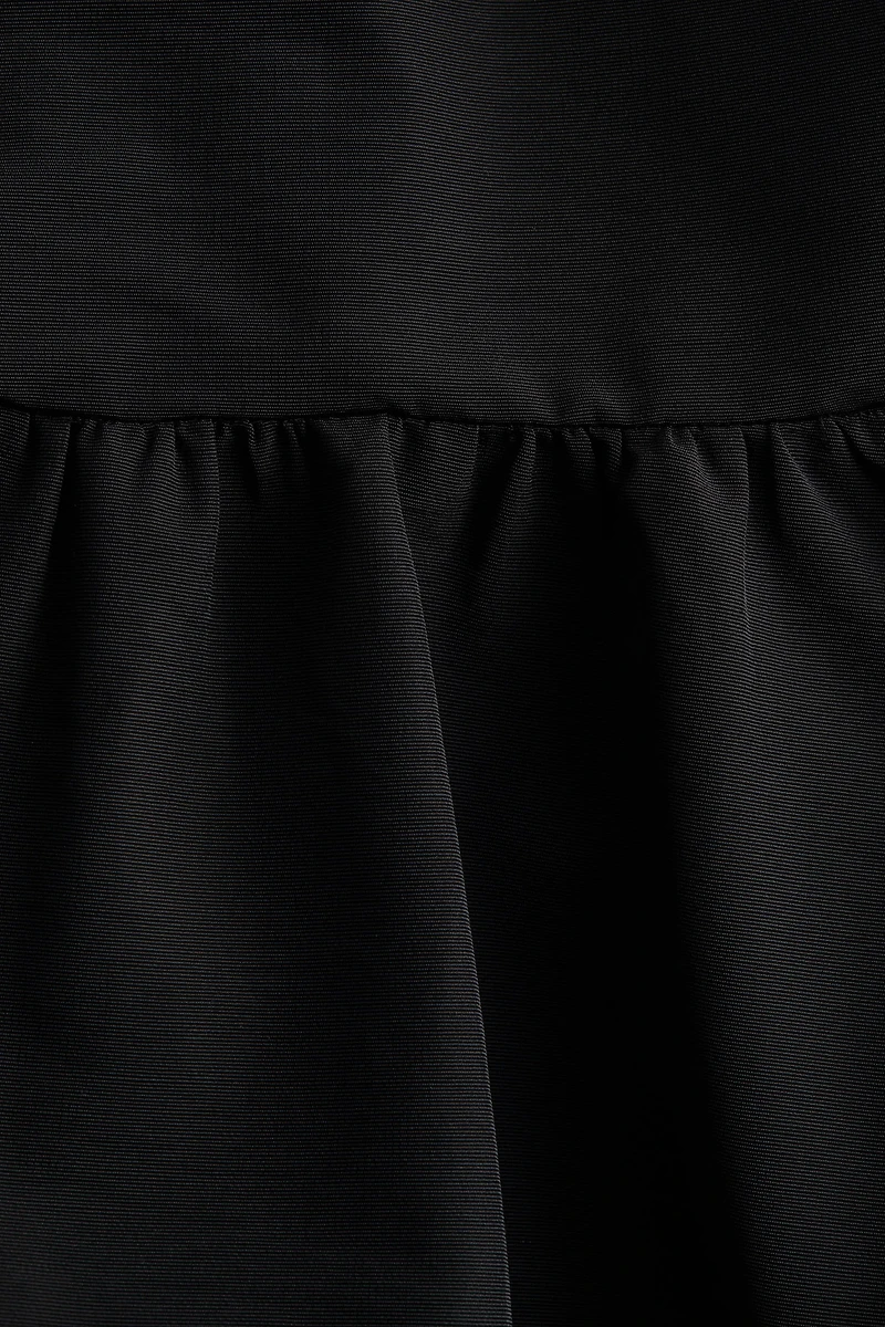 Tie-Detail Peplum Top