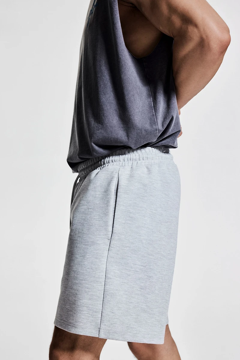 Mid-Length Sports Shorts with DryMove™