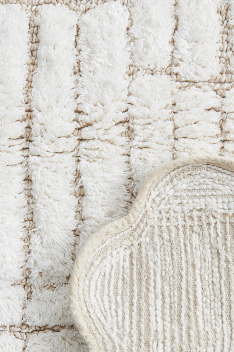 Tapis de bain en coton bouclé