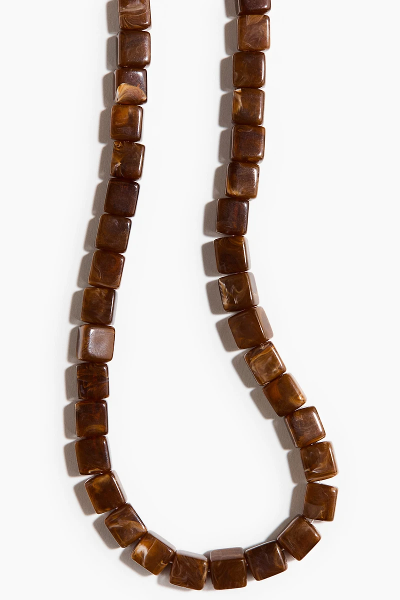 Collier avec perles fantaisie