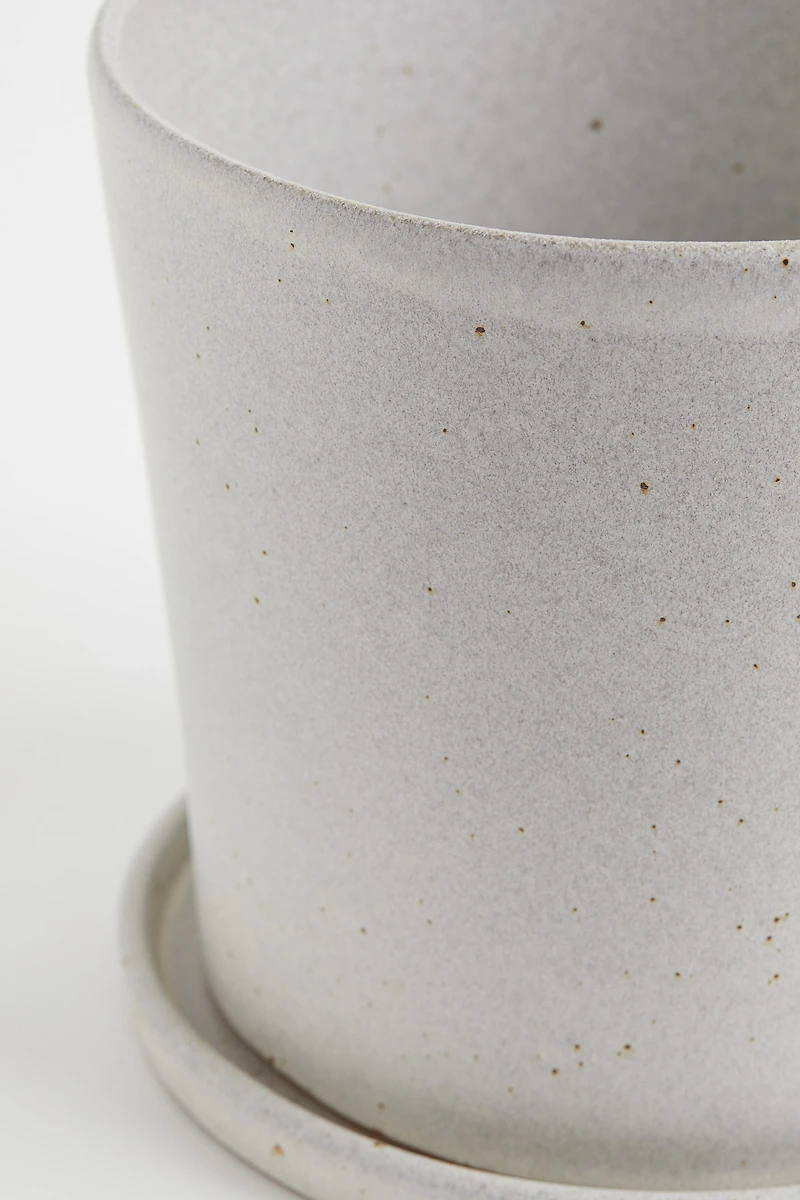 Pot de fleurs avec soucoupe