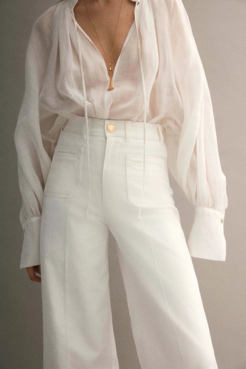 Jean taille haute avec jambes larges