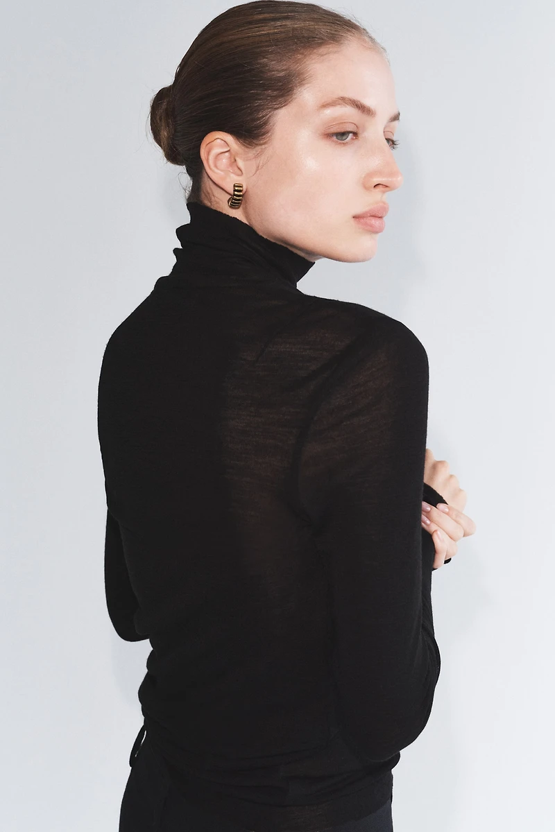 Haut à col cheminée en laine mérinos