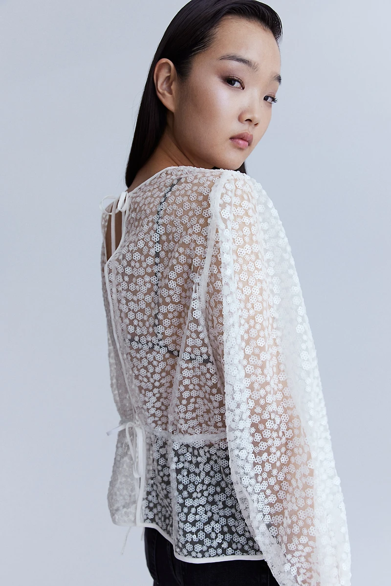 Sequined Peplum Blouse