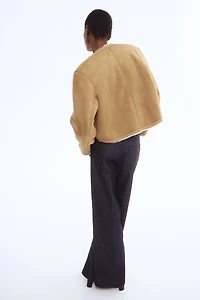 Veste doublée de tissu peluche