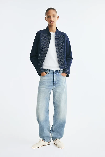 Veste en denim avec pattes boutonnées