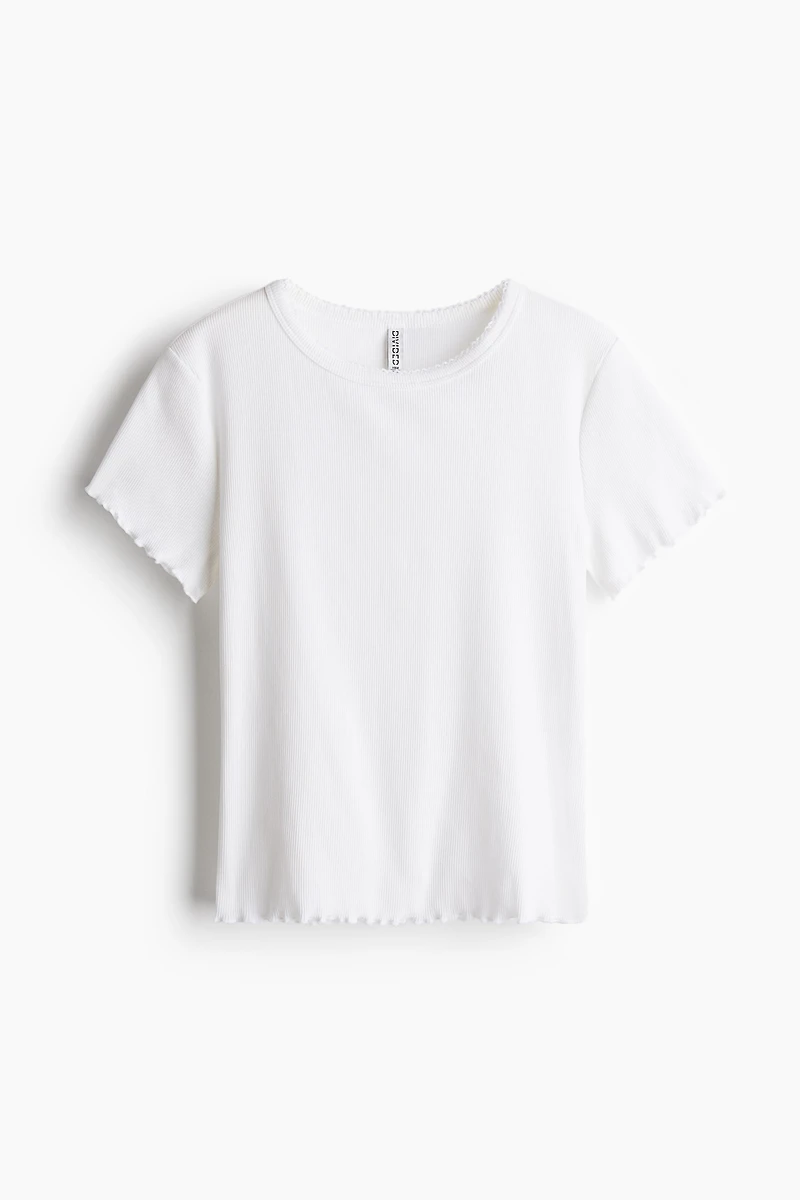 T-shirt avec détails surjetés