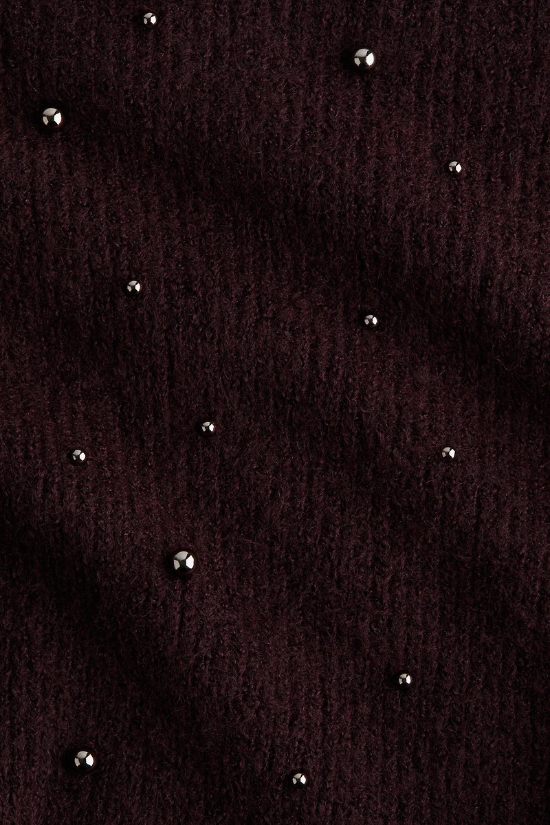 Haut péplum avec perles fantaisie