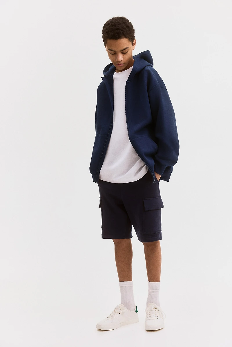 Veste à capuchon glissière