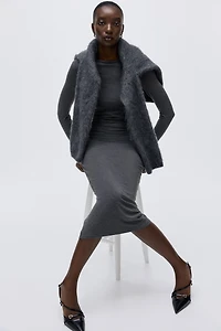 Robe moulante à effet drapé