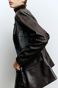 Veste en tissu enduit