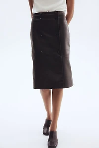 Jupe portefeuille en tissu enduit