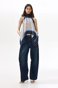 Haut dos nu en satin