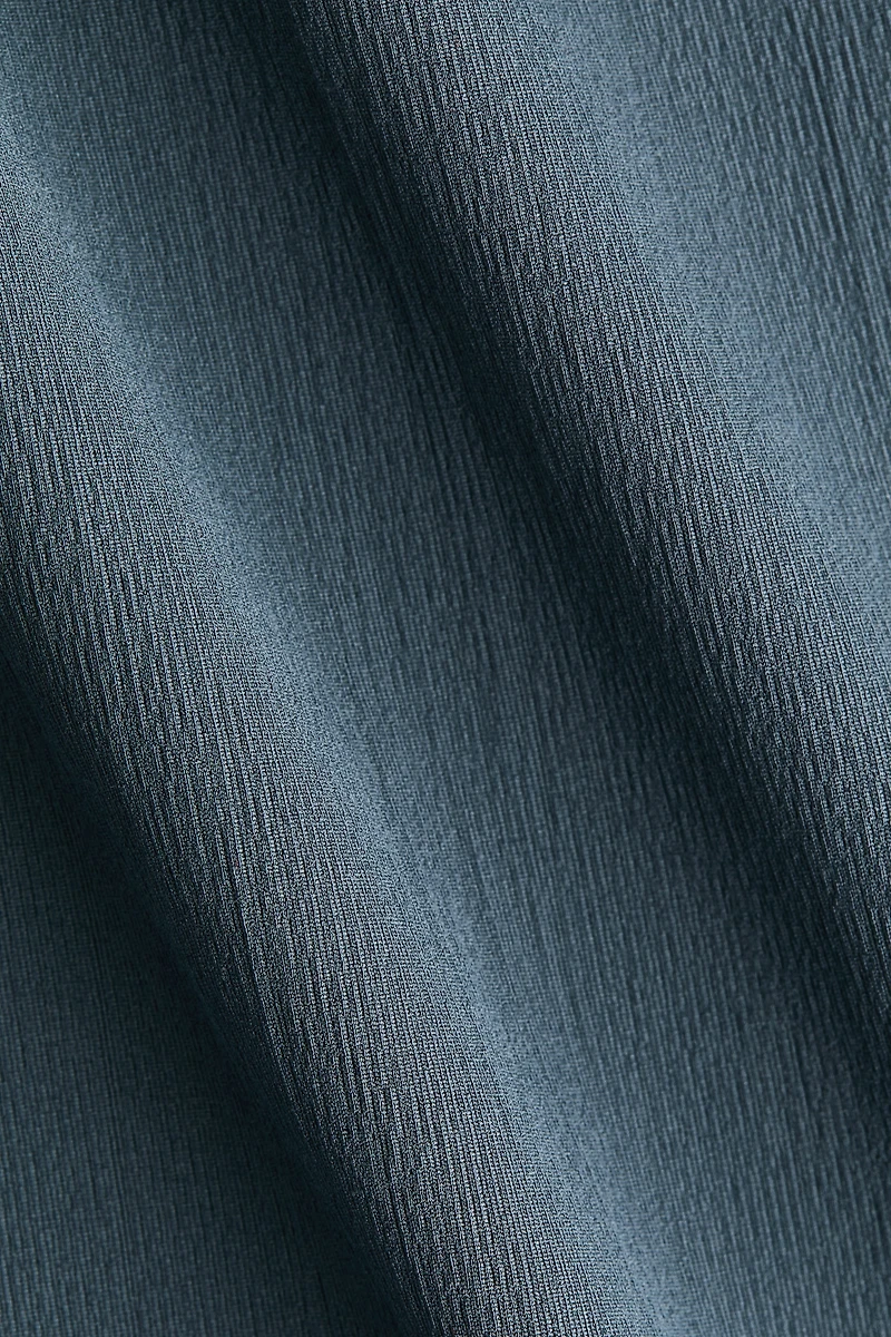 Haut froissé à effet drapé