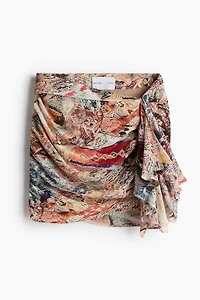 Minijupe à effet drapé