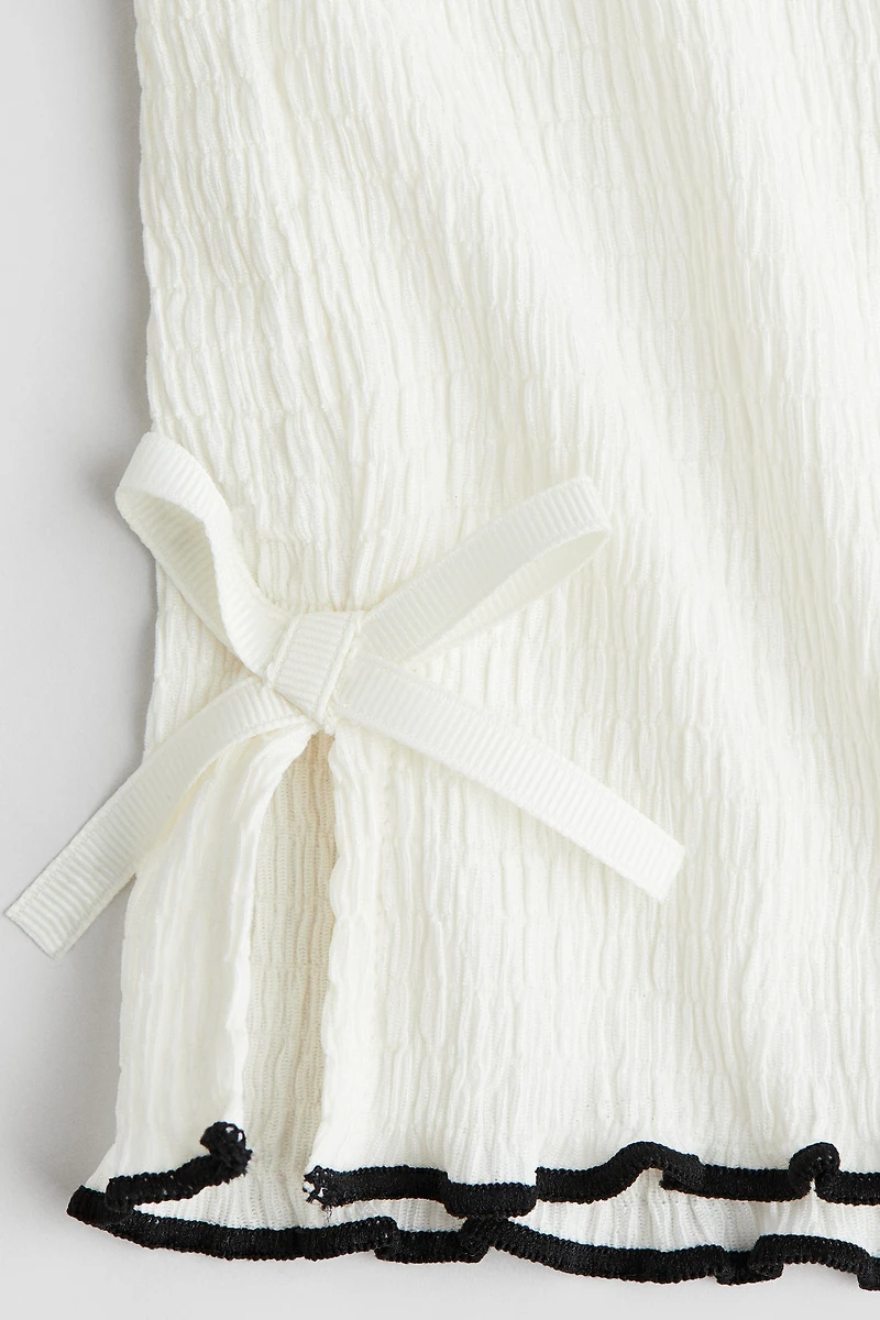 Haut avec boucle